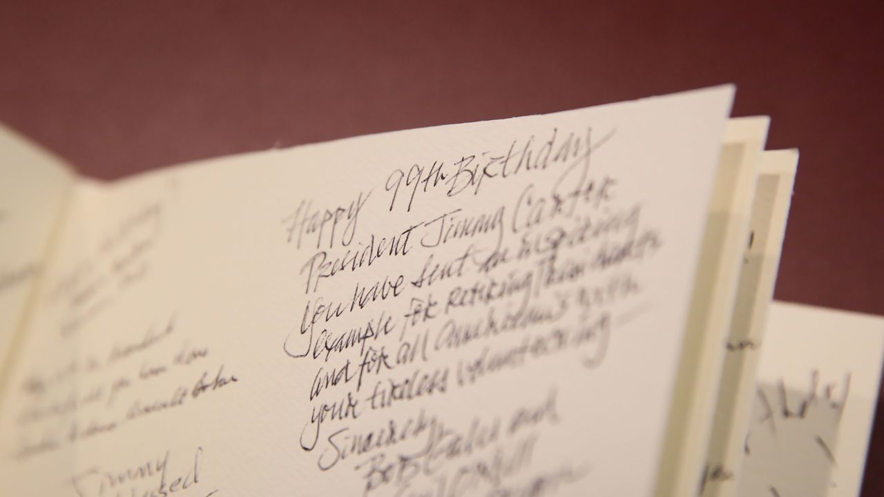 Birthday wishes for Jimmy Carter are seen Thursday in a book at The Carter Center in Atlanta.